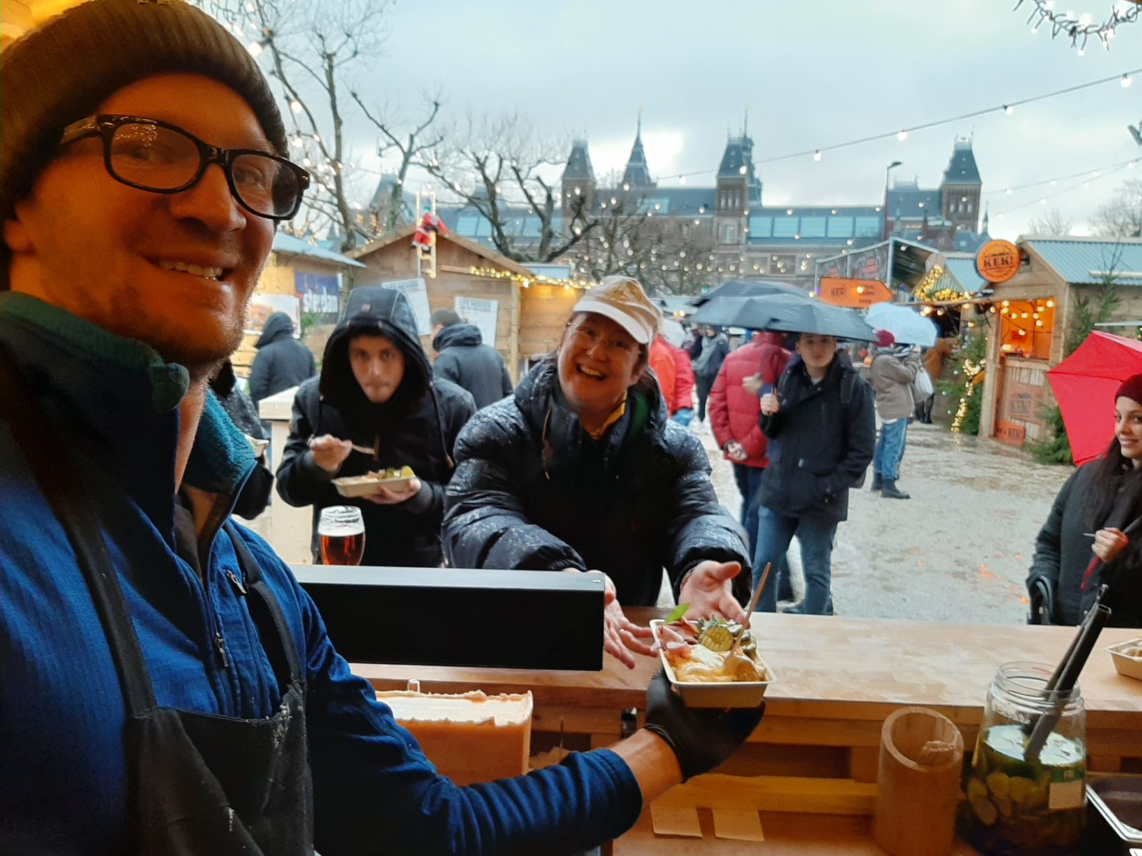 Serving customers at a winter market in Amsterdam